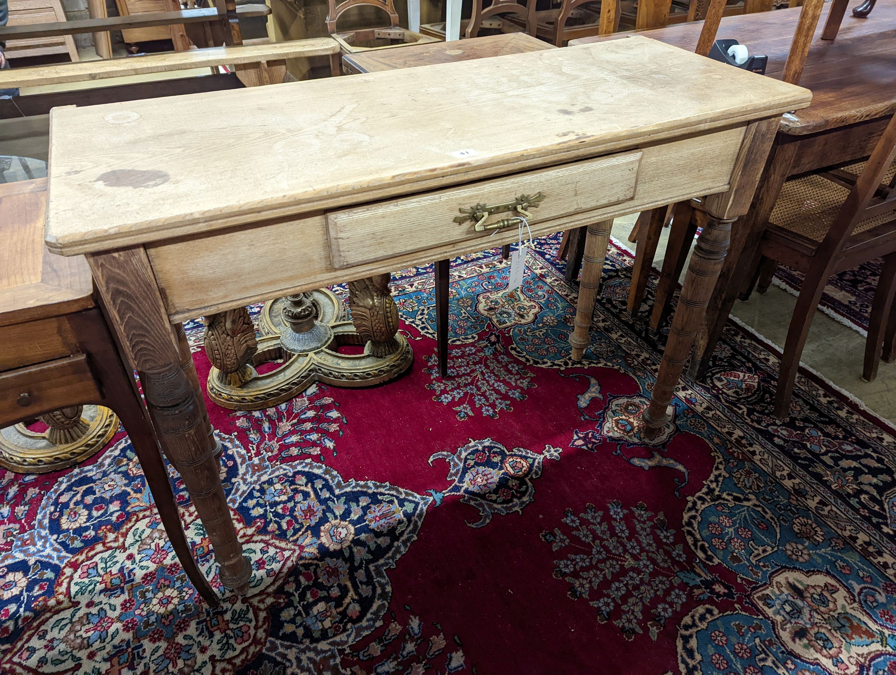 A Victorian ash hall table, Urquhart & Adamson cabinet makers Liverpool W-114cm, D-46cm, H-83cm.